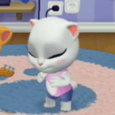 a white cat in a pink tank top and blue shorts is standing on a rug