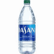 a bottle of dasani purified water with a green cap .