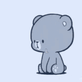 a white teddy bear is kissing a gray teddy bear on the cheek .