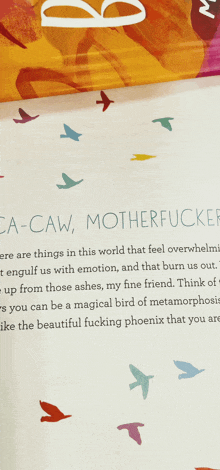 a book called ca-caw motherfucker is open to a page