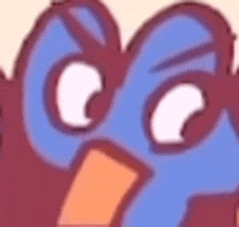 a close up of a cartoon bird 's face with big eyes and a large beak .