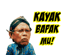 a man wearing glasses and a headband with the words kayak bapak mu