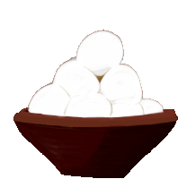 a brown bowl filled with white balls of food