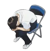 a man is sitting on a blue chair with his head in his hands