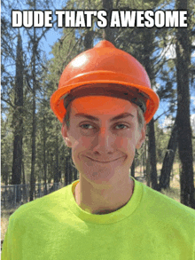 a man wearing an orange hard hat with the caption dude that 's awesome on the bottom