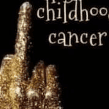 a close up of a hand giving the middle finger with the words `` childhood cancer '' in the background .