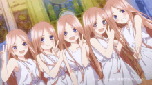 a group of anime girls are standing next to each other and giving a peace sign