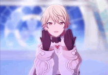 a girl with blonde hair and purple gloves is making a heart shape with her hands .