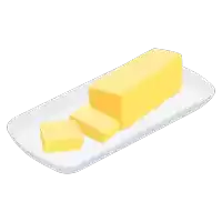 a block of butter on a white plate with two pieces cut out of it