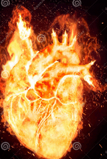 a burning heart with flames coming out of it on a dark background