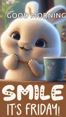 a bunny with a cup of coffee and the words `` good morning smile it 's friday '' .