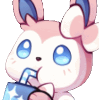 a pink and white rabbit with blue eyes is drinking from a cup .