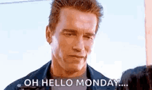 arnold schwarzenegger is talking to a woman and says `` oh hello monday ... '' .