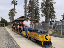 a group of people are riding on a train that says cookie systems