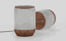 a cylindrical object with a wooden base and top