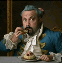 a man in a blue coat is eating a piece of cake from a plate .