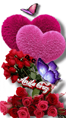 a bouquet of red roses with pink hearts and a butterfly