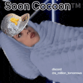 a picture of a woman wrapped in a blanket with the words soon cocoon tm on the bottom