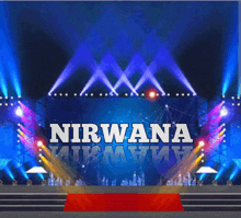 a stage with a red carpet and the words nirvana on it