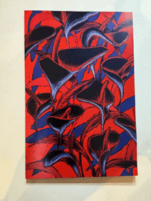 a painting of red and blue flowers on a white background