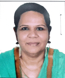 a close up of a woman 's face wearing a green shirt