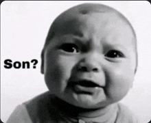 a black and white photo of a baby with the words son written on the bottom
