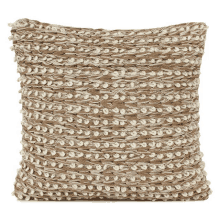 a brown and white pillow with a knitted pattern on it