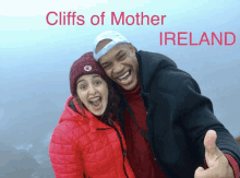 a man and a woman are posing for a picture with the words cliffs of mother ireland above them