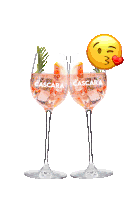 two cascara wine glasses with a kissing emoji