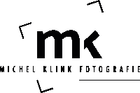 a black and white logo for michel klink fotografie