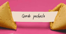 a fortune cookie has a piece of paper that says gordo pochoclo