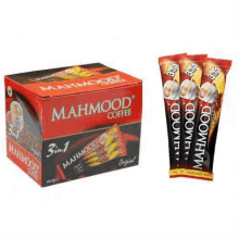 a box of mahmood 3 in 1 coffee sticks next to a package of coffee sticks .