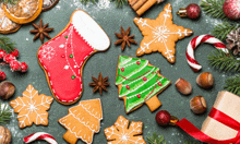 gingerbread cookies in the shape of a christmas stocking a christmas tree and candy canes