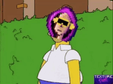 homer simpson is wearing headphones and sunglasses while standing in the grass with a purple object on his head .