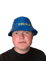 a man wearing a blue bucket hat that says ikea