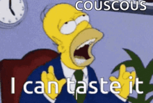 homer simpson from the simpsons is sitting in a chair with his mouth open and says couscous i can taste it .