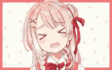 a girl with braids and a red bow making a sad face with her eyes closed