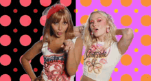 two women standing next to each other with one wearing a shirt that says ' states ' on it