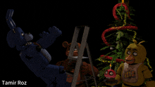 a picture of five nights at freddy 's characters decorating a christmas tree with the name tamir roz at the bottom