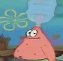 patrick star from spongebob squarepants is blowing a bubble from his mouth .