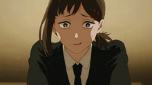 a close up of a girl 's face with tears running down her cheeks