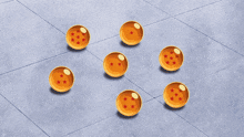 a bunch of gold coins are floating on a tiled floor