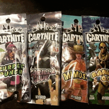 four bags of cartnite gum are lined up next to each other