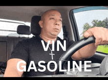 a man driving a car with the words vin gasoline written on the bottom