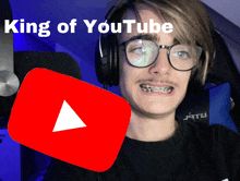 a man with glasses and braces is sitting in front of a youtube icon