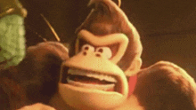 a close up of donkey kong 's face with his mouth open and a frog behind him .