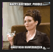 a picture of a woman holding a martini with the caption " happy birthday poodle "