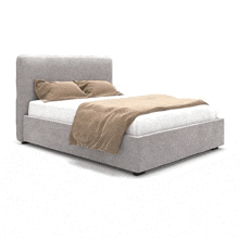 a bed with a white mattress and brown pillows