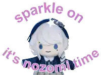a sparkle on it 's nozomi time sign with a stuffed doll