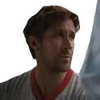 a man in a white shirt with a red collar